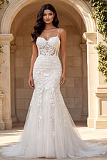 Spaghetti strap lace mermaid gown with floral embroidery and soft tulle train.
