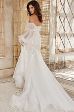 Back view of model wearing Jovani JB38491 white dress highlighting the silhouette.