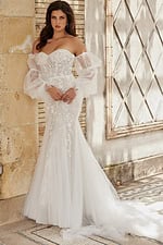 Model in Jovani JB38491 white dress, full length front view.