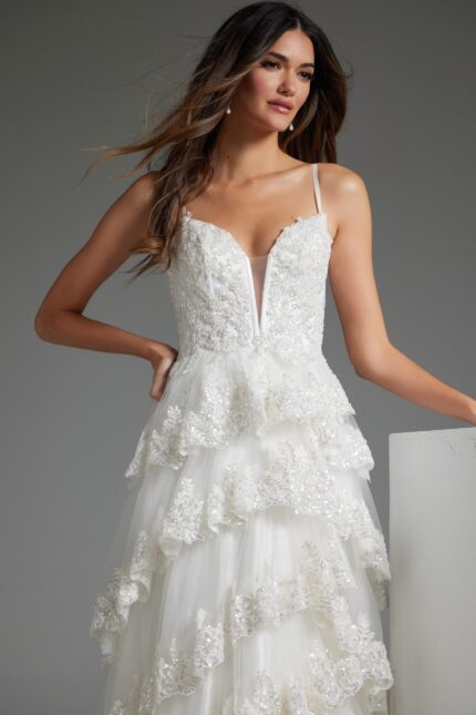 Model wearing JB38641 white dress, front view highlighting lace details and sweetheart neckline.