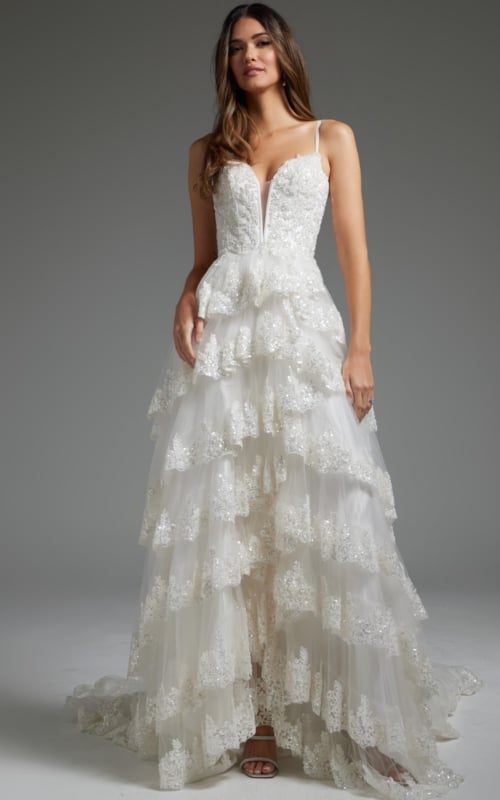 Model wearing JB38641 white dress, front view with layered skirt and sweetheart neckline.