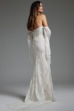 model in Jovani jb39162 gown displaying back with lace details