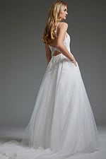 Rear view of Jovani jb40513 ivory dress with flowing tulle skirt and open back.