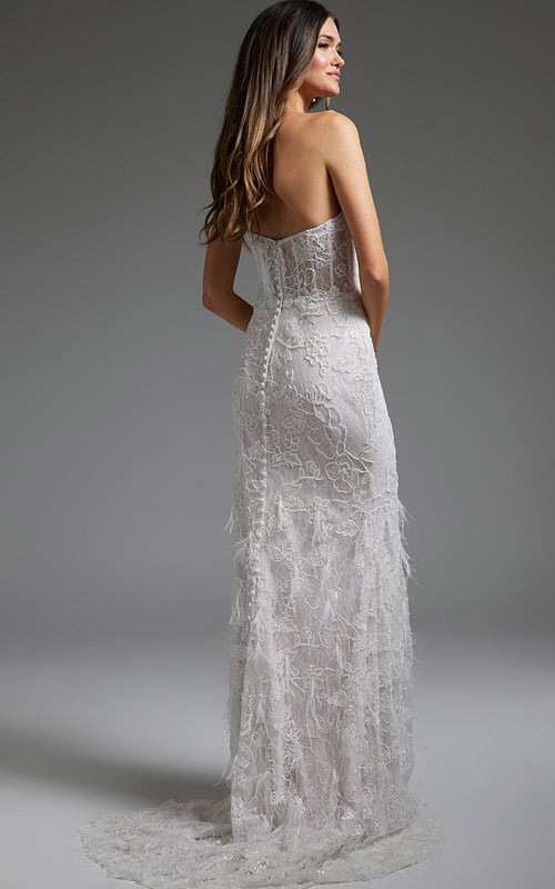 model wearing Jovani JB40590 back view white lace gown with low scoop