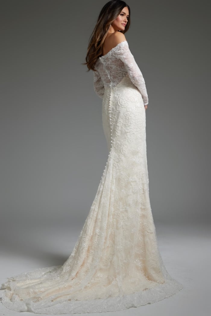 Model wearing JB40591 white gown with lace sleeves, back view with train