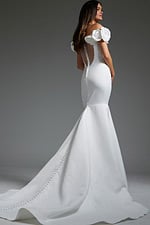 Model wearing Jovani JB40594 white mermaid gown back view with train