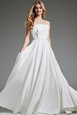 Model wearing Jovani JB40599 elegant white gown showcasing stylish design, front view.