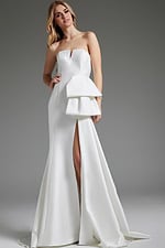 Woman wearing Jovani JB40791 white gown, highlighting its elegant silhouette.