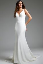 Model in Jovani JB42222 ivory dress showing side view and fitted silhouette.