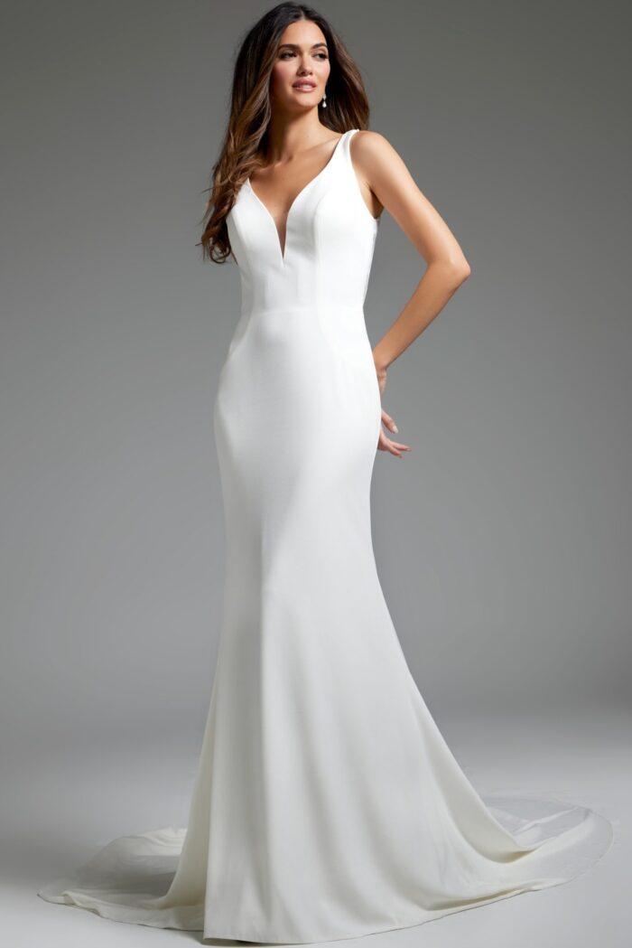 Model in Jovani JB42222 ivory dress showing side view and fitted silhouette.