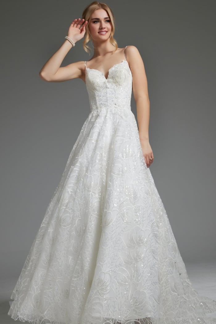 Model in Jovani JB422225 ivory gown with lace details and A-line silhouette, front view.