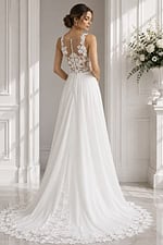 A-line gown with sheer floral lace back and delicate button detailing.