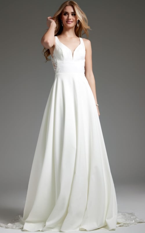 Model wearing Jovani JB42294 ivory dress, front view, featuring a V-neckline and A-line silhouette.