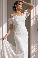 Deep V spaghetti strap floral lace mermaid wedding gown with sheer embroidered bodice and soft skirt flare