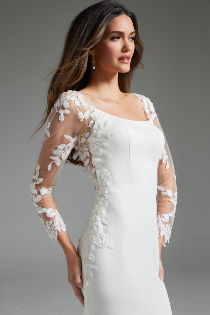 Close-up of Jovani JB42297 ivory gown, featuring a square neckline and intricate lace sleeves.