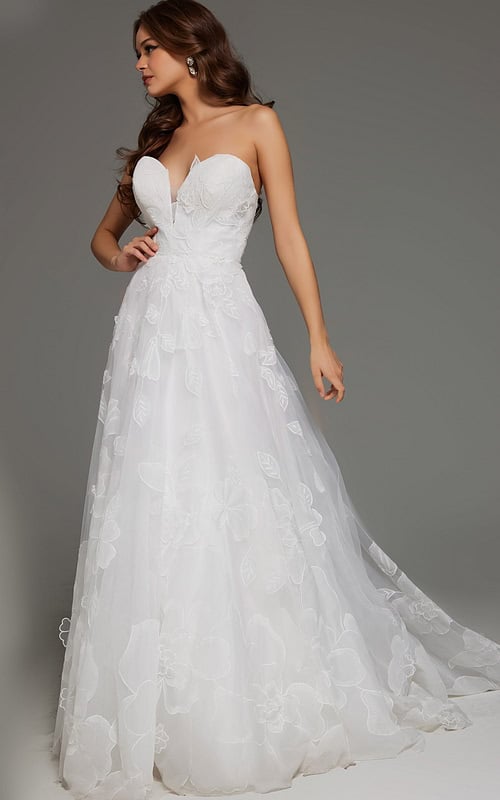 Front view of model wearing Jovani JB42324 ivory gown with floral appliques and sweetheart neckline.