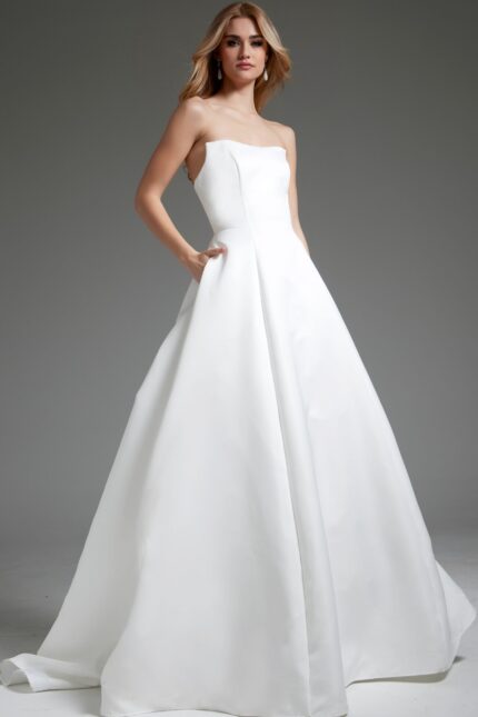 Model wearing Jovani JB42346, side view of elegant off-white dress.