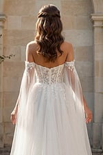 Back view of off shoulder bridal gown with lace bodice and soft tulle skirt