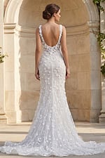 Romantic wedding dress with 3D floral appliqués