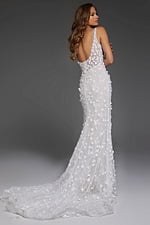 Model wearing Jovani JB42483 back view of white gown with plunging back and train.