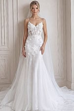 ivory 3D floral lace fitted mermaid wedding dress with V neckline, spaghetti straps and tulle cape train, front view, Jovani Bridal style JB42484