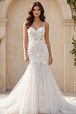 White lace mermaid bridal gown with floral applique and layered tulle train