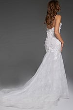 Model wearing Jovani JB42484 white mermaid gown, showcasing the elegant back and sweeping train.