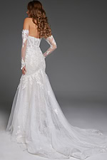 Back view of Jovani JB42486 white mermaid gown showing long lace sleeves and train.