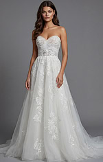 Sophisticated lace A line bridal gown with embroidered floral accents and flowing train