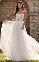 Dreamy ivory gown with floral embroidered overlay and graceful full skirt