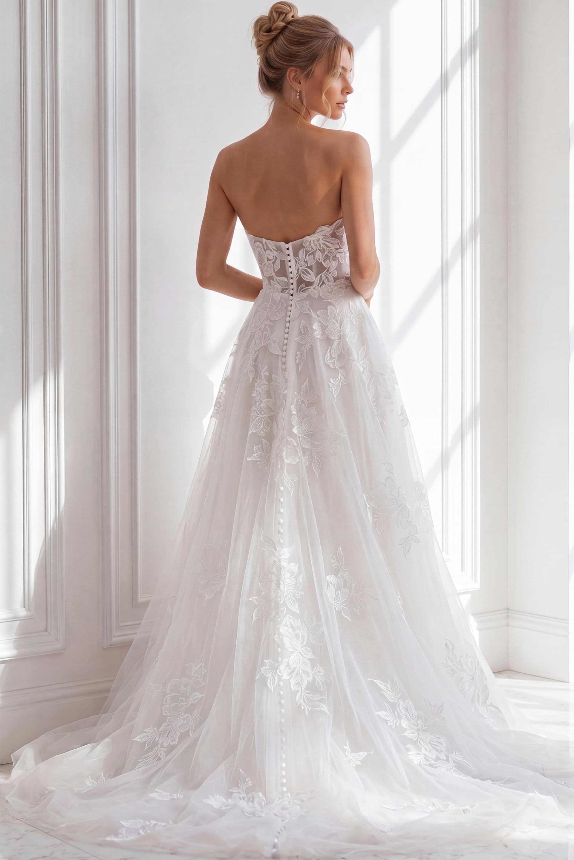 Strapless ivory wedding gown with a softly structured bodice