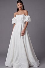 Bridal ball gown with dramatic puff sleeves and sweeping skirt