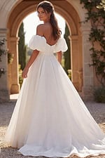Elegant bridal gown with structured bodice and voluminous skirt