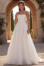 Romantic wedding dress with off shoulder puff sleeves and ball gown silhouette