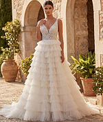 Soft tulle ball gown with cascading layered ruffles