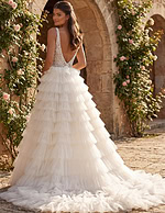 Couture style tiered tulle ball gown with delicate lace detailing