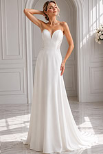 Modern minimalist wedding dress designed with graceful lines, supportive structure, and romantic floral lace touches.