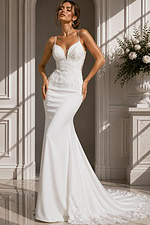 Minimalist Crepe Mermaid Gown – Sleek silhouette with delicate lace appliqué, spaghetti straps, and a soft chapel train.