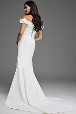 Model wearing Jovani JB43323, ivory dress with lace-up back and floor-length design, showcasing the elegant back view.