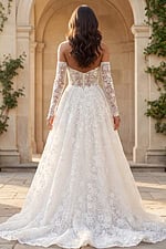 Off shoulder lace A line bridal gown with sheer long sleeves and sheer illusion back.