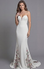 Chic bridal gown with sweetheart neckline and intricate floral embroidery