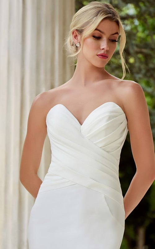 model wearing v neck ruched bodice wedding dress JB45121