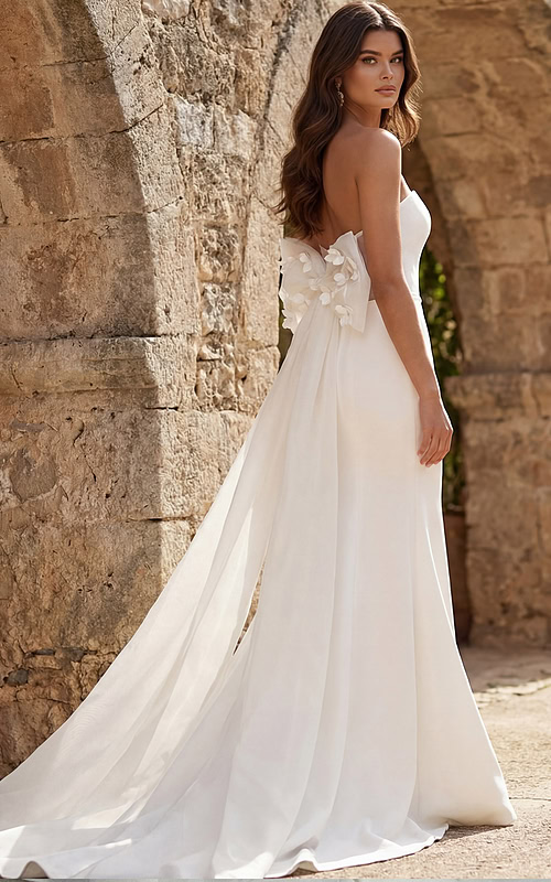 Classic strapless bridal gown with tailored bodice and graceful train