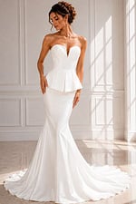 Modern satin bridal gown featuring a sweetheart neckline and sculpted silhouette.