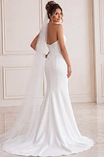 white satin strapless fitted mermaid wedding dress with asymmetric neckline and dropped corset waist, front view, Jovani Bridal style JB49077