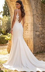 Sophisticated sheath gown with plunging neckline and floral appliqué strap