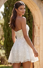 Chic embellished short dress with floral appliqué and playful A line skirt