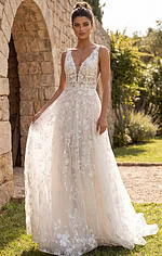 Ethereal floral lace dress with sheer bodice detail and sweeping train