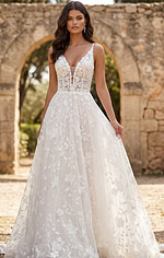 Elegant lace dress with delicate floral embroidery and airy tulle overlay