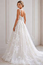 Fitted mermaid silhouette with the same floral lace.